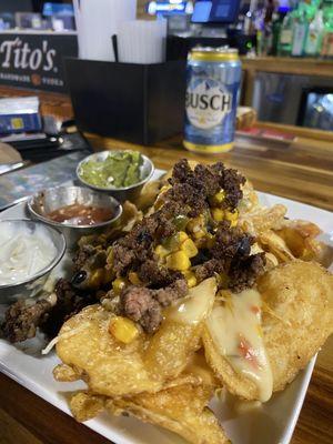 The trashcan nachos are amazing! they're made with real potatoes.