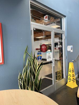 This is the entrance in the waiting area into the service and parts area. It's very comfortable here.