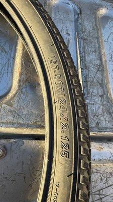 this is a flat tire that ended up with a rip in the tread so we could reuse it.