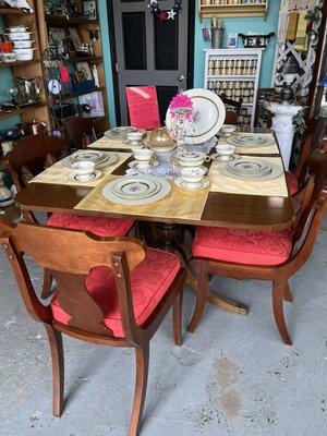 Dining room table,6 chairs,3 extensions, and pads to cover table.