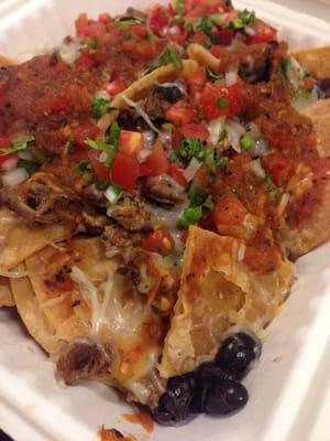 Super nachos: chips, carne asada, black beans, salsa, and cheese. Reg. $8.69 but with today's Go Dish app $4.34 + tax.