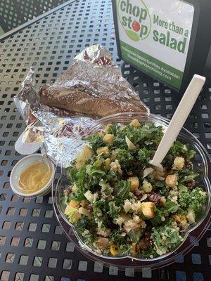 Custom made salad with warm pretzel