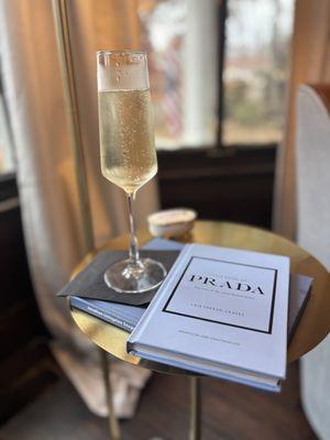 Enjoyed a glass of bubbly while waiting.