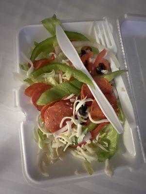 This is their "antipasto salad". What a joke. Pizza sliced pepperoni, green peppers and some cheese over some Lettuce is far from it