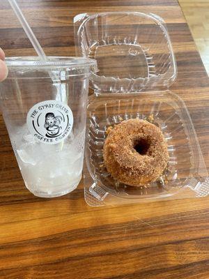 Iced coffee that didn't make it home and a cinnamon sugar doughnut.
