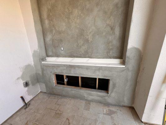 Patio enclosed
Stone installed
Next up is paint, tv mounted and an electric fireplace!