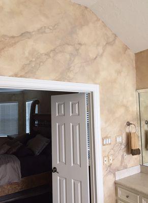 Faux Finished master bathroom done in a marbling and veining technique.