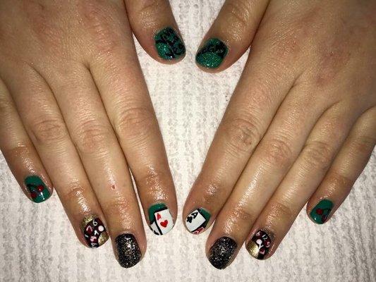 Vegas Nails! Hand painted designs on gel polish manicure.