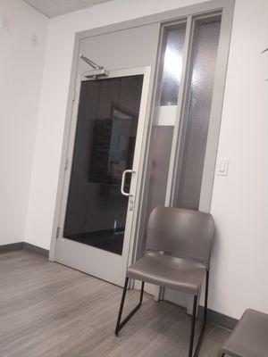 The front door is tinted, so it looks like the office is closed from the outside.