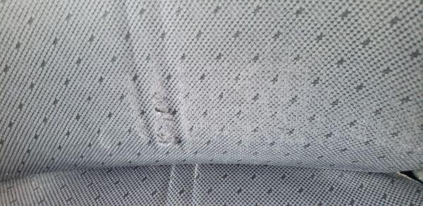 Close up of Fabric Tears 1 after taking my car to L & T Japanese Automotive.