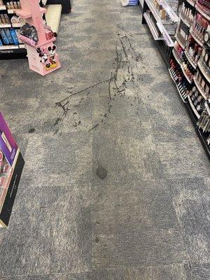 Dirty rugs.  In every aisle