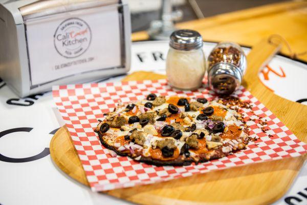 Carnivore Pizza on Cali'flour Foods Crust.