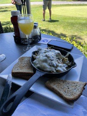 Daily special - cheese steak omellette on skillet