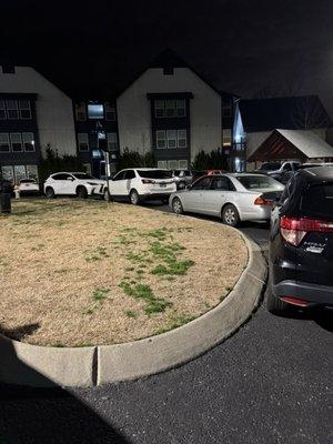 Cars parked around curve