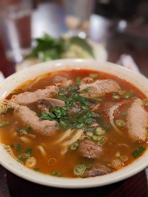 Bun bo hue with pork ribs, pork loaf, and beef