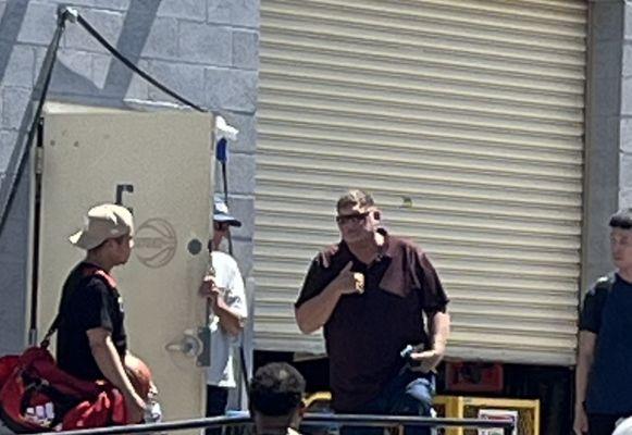 the big white guy is the owner of the gym