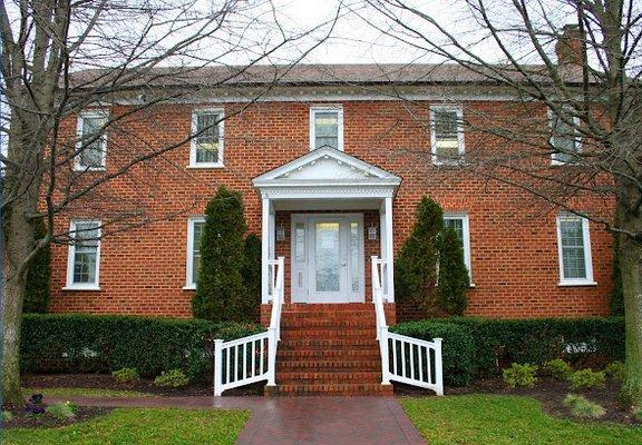 View of office location, Brick building.