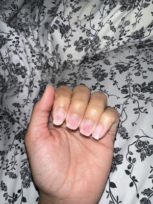 After she finished my nails. The red parts of my nail HURT.
