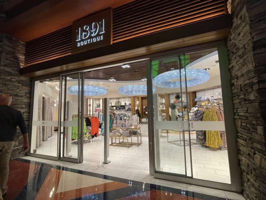 Store front , take escalator to the first floor