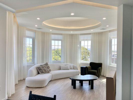 Sheer drapes with ripplefold pleat in a living room in Newark, NJ