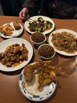 Crab Rangoons, egg rolls, chicken lo mien, sesame chicken, broccoli beef, pork fried rice.