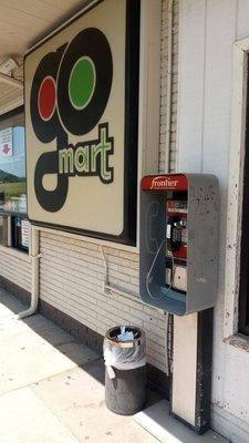 There is a payphone here, but it's disconnected. The phone company never picked it up.