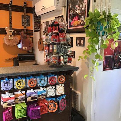 In addition to guitars and repair, we carry lots of accessories like strings, picks, capos, slides, effect pedals, straps and more!