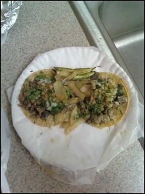 tacos de lengua with grilled onions and jalapeno