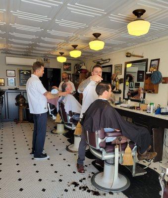 Mancave of a barbershop! It's realy awesome in there! 3 barbers, working hard. Mmmm!