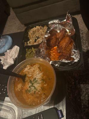 Gumbo and chicken wing plate with dirty rice and green beans