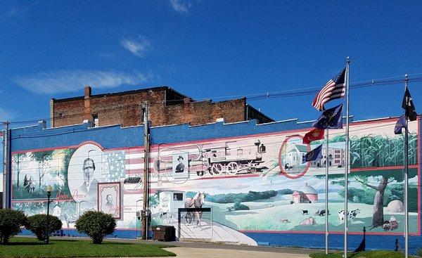 the west wall of the mural was completed in 1997 and has numerous scenes from the city's past