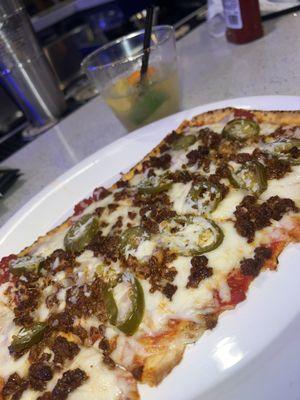 Flatbread chorizo and jalapeño with a Paloma