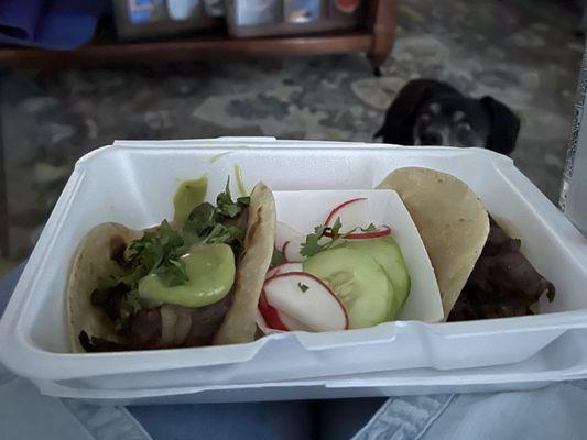 2 prime rib taco's on flour tortillas. With a hungry dog looking on hoping I will drop something. ;-)