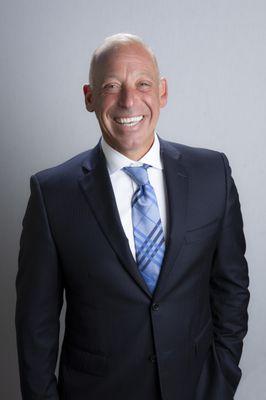 Attorney Philip J. Sporn in his NYC office, known for his dedication, compassion, and fierce advocacy. With over three decades of experience