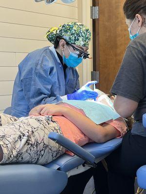 Dr Maddox doing a tooth sealant