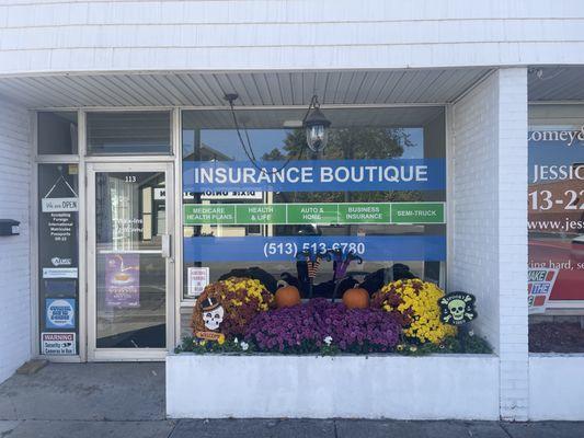 Our beautiful fall flowers in front of our downtown Mason location