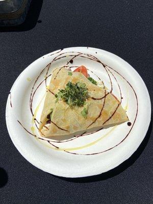 Delicate savory crepe folded and topped with microgreens, and finished with a balsamic glaze -- light, fresh, and flavorful.