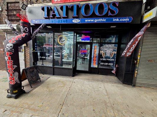 Tattoo & piercing studio at 1763 Union St, Brooklyn. Bold look, neon signs, and a welcoming vibe that invites you to step inside.