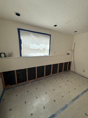 After the flood cuts are complete the insulation is removed to dry and clean the wooden beams