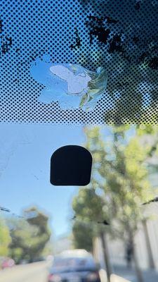 Damaged caused by attaching mirror "directly to glass" vs the black designated area. Result mirror fell fell off with a chunk of glass.