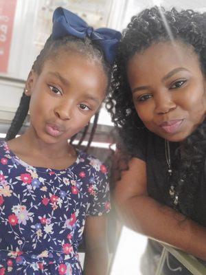 She got her ears pierced and thought it was going to be painful. This is her look after being pierced lol.