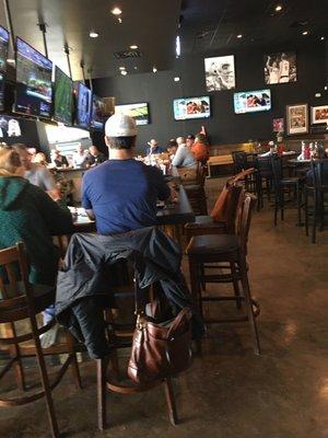 Best seats in town! North facing bar with 24 seats and\ a bank of TV's!