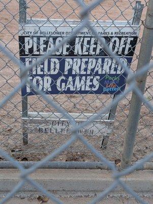 Sign for keeping off the field prepared for games