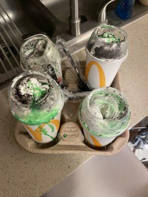 Not mixed up shamrock Oreo McFlurrys. One didn't even have any flavor and they wanted to hand them to us like this without a drink carrier.