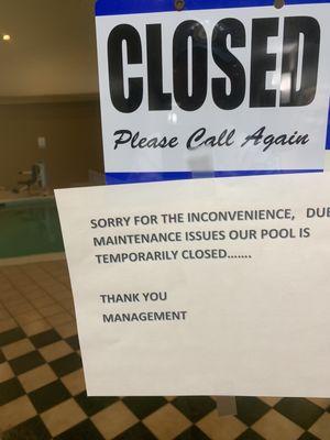 Pool closed sign.