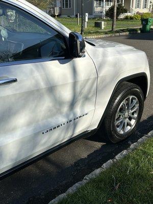 Repaired door and Grand Cherokee badging