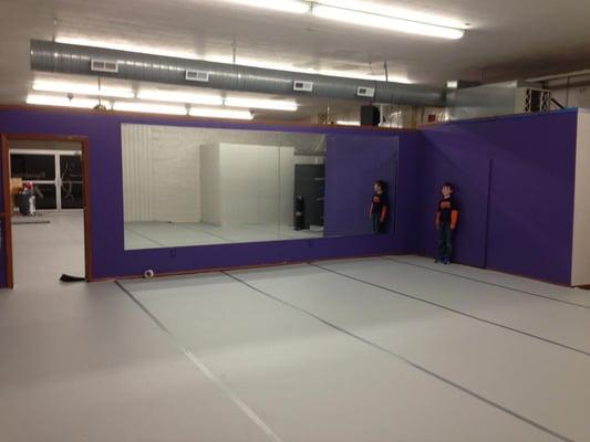 Room 2 - a 28ft X 34ft room with a sprung wooden floor that is covered in Adagio dance surface.