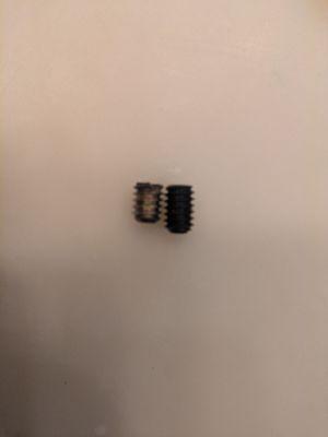 New set screw next to old one