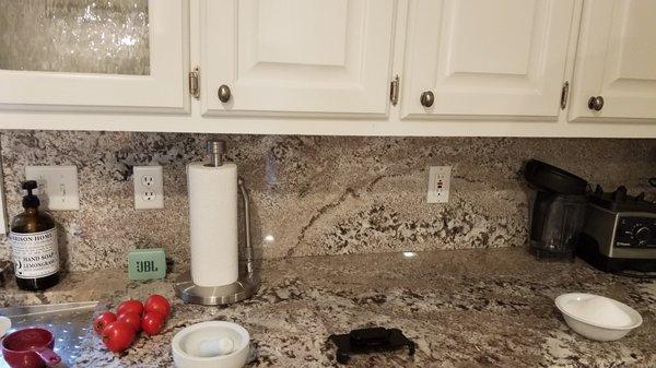 Removing marble backsplash and adding subway tile.