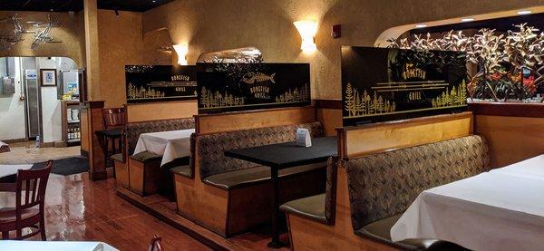 Custom sneeze guards/booth dividers with decorative gold vinyl for a local restaurant.